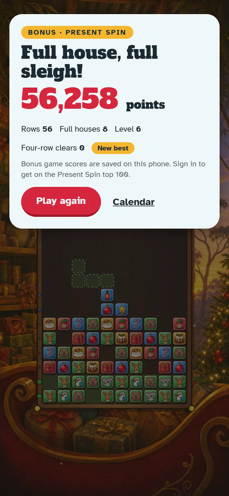 Results screen for Present Spin, with the score, stars, Play again and the share buttons.